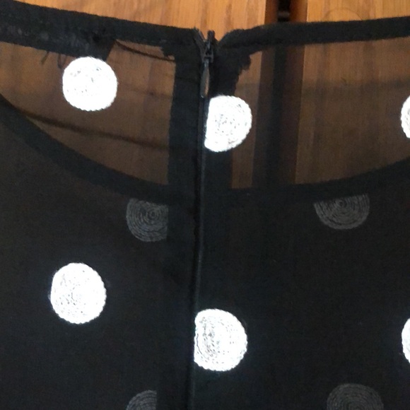 Sheer black and off white flared top with flared split sleeves. - Picture 4 of 11